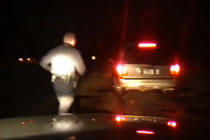 Drunk Driver Shoots At Cop