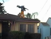 Guy Body Slams Buddy Off Roof